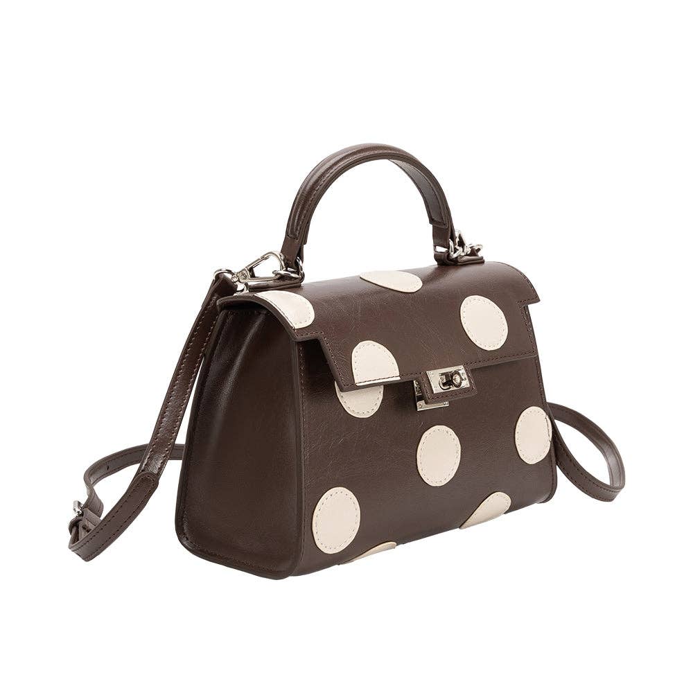 brown hand bag with cream polka dots