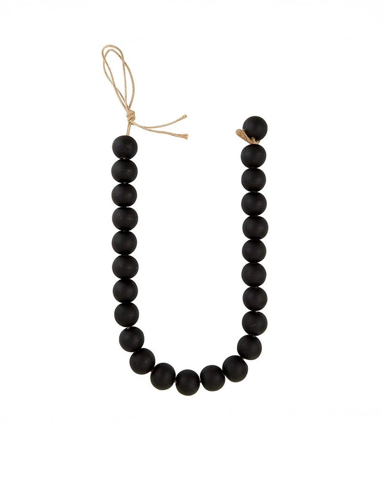 a picture of decorative beads in black glass or white glass