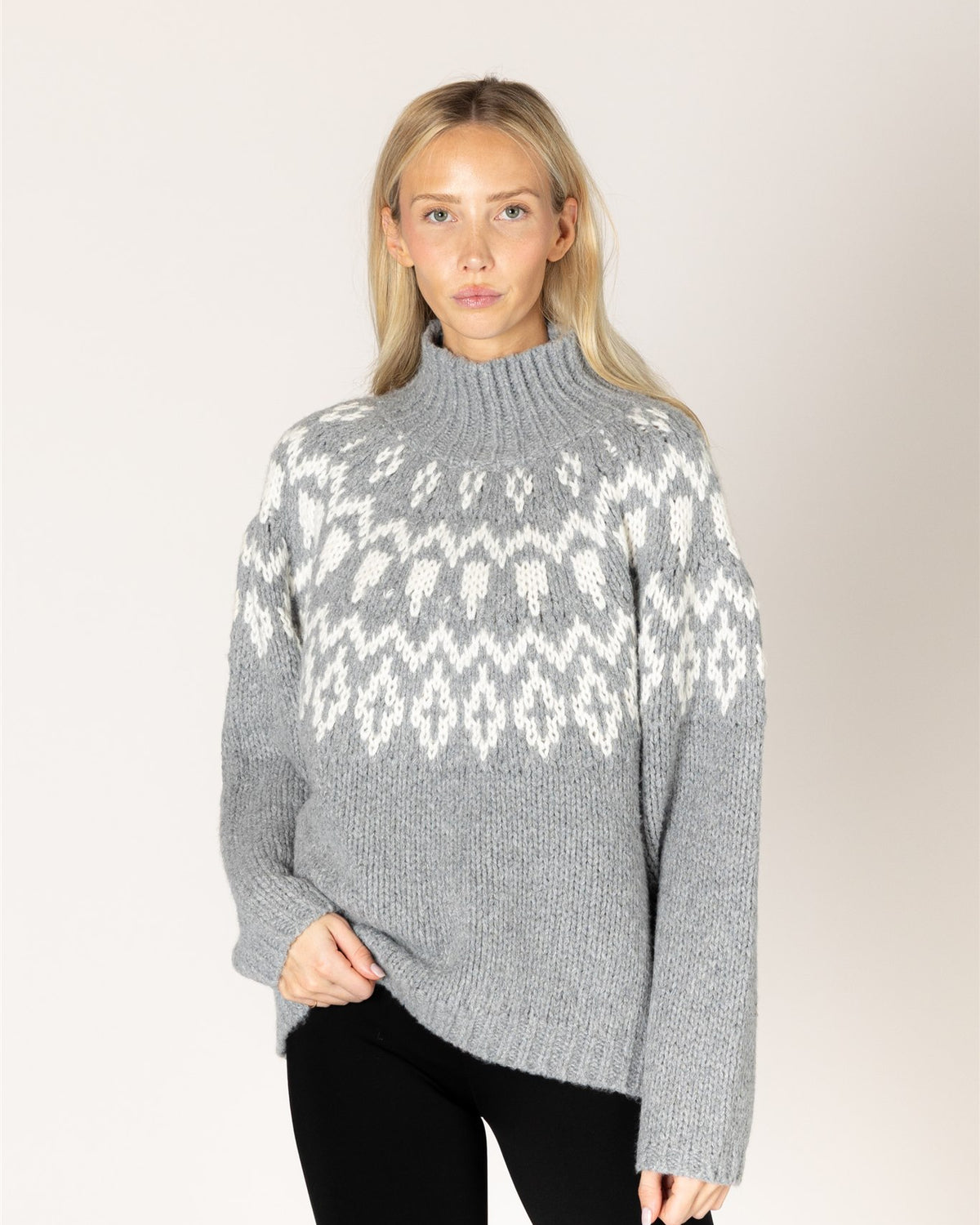 grey mock neck sweater with white fair isle design
