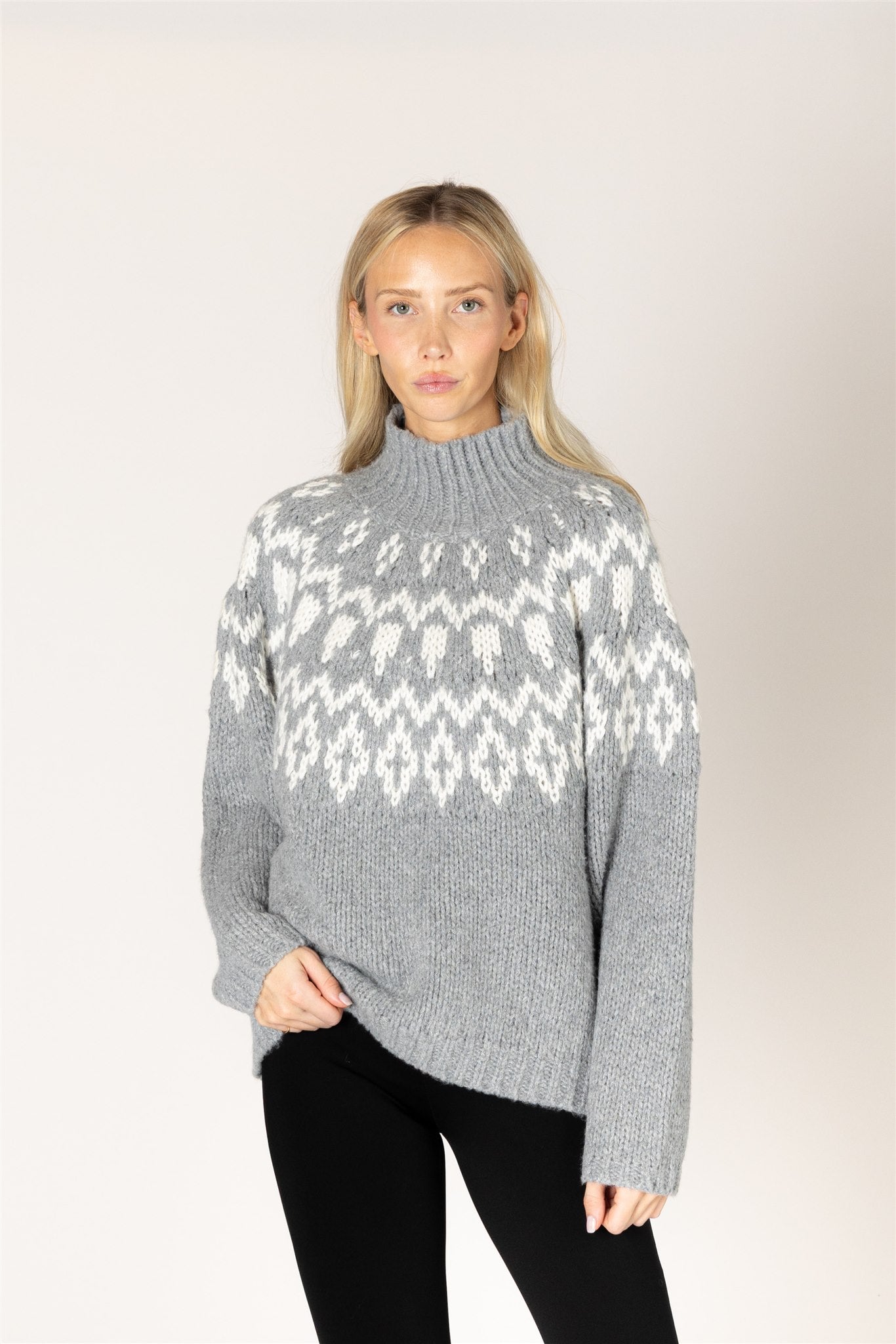 grey mock neck sweater with white fair isle design