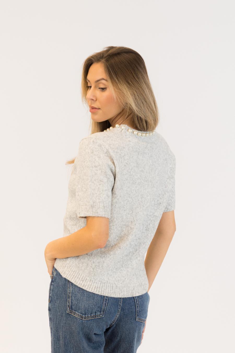 grey knit tee with pearls on the neck line