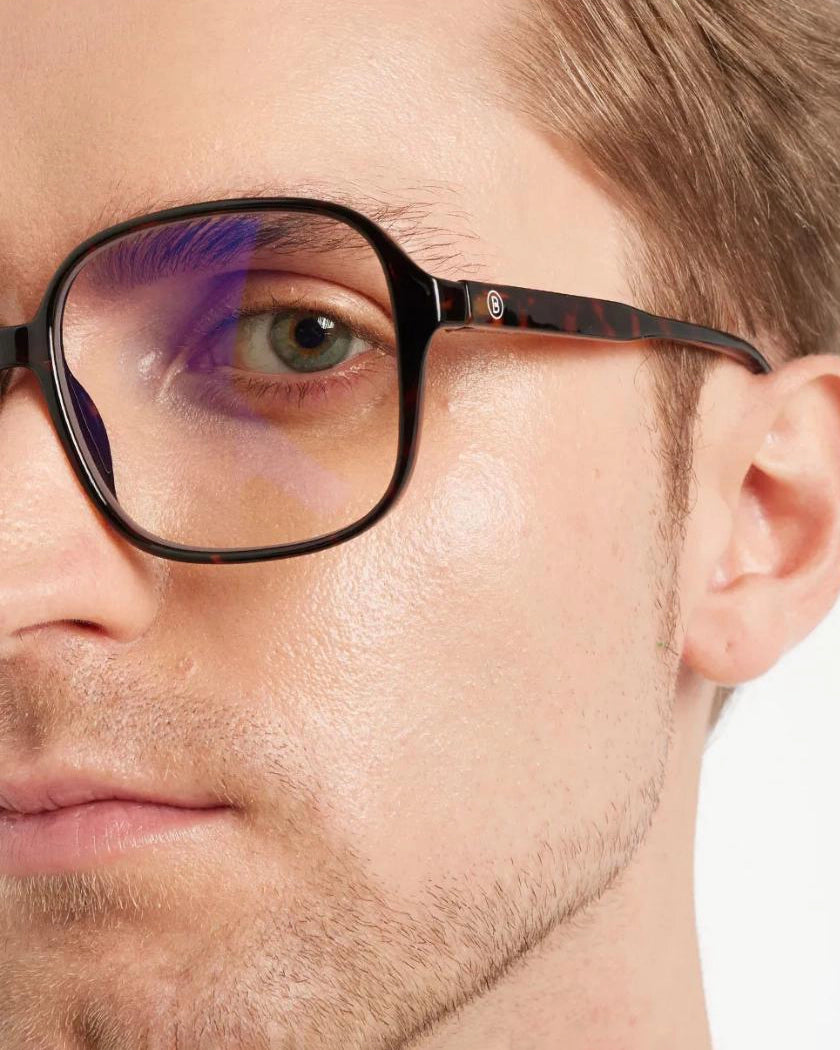 man wearing a set of tortoiseshell square framed eyeglasses for blue light by Barner