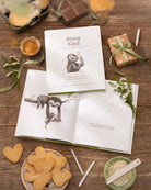Flat lay shots of children's Book called 'Being Kind: How to add more meaning to your moments' by Kobi Yamada with a sloth listening to a duck