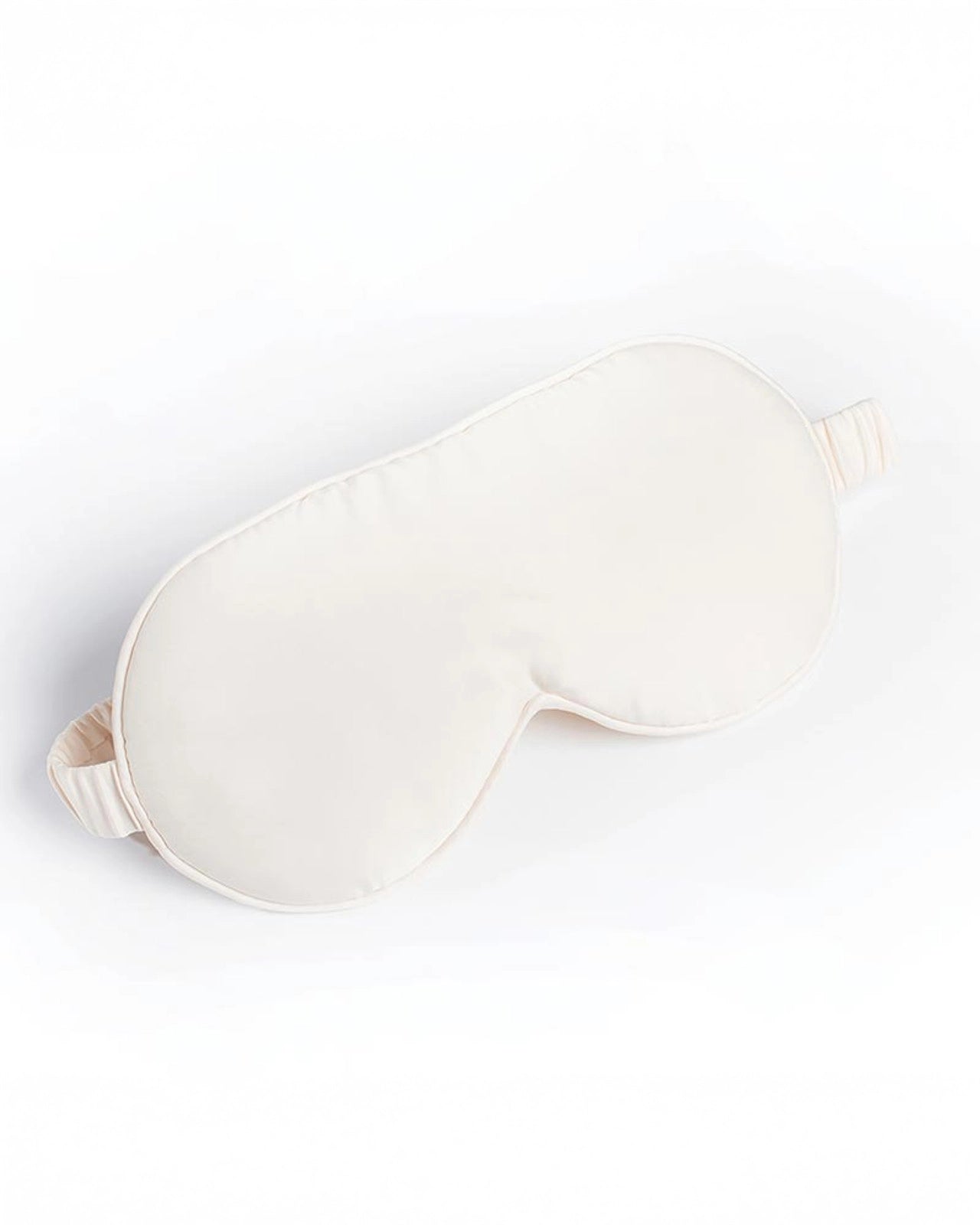 a picture of a white silk sleep mask