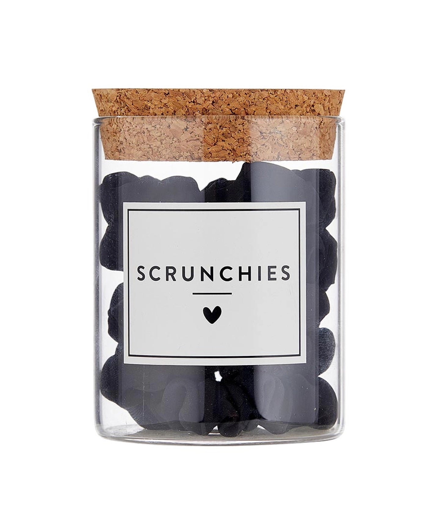 a glass jar of black satin scrunchies for gifting