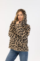 animal print coat with scarf