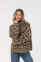 animal print coat with scarf