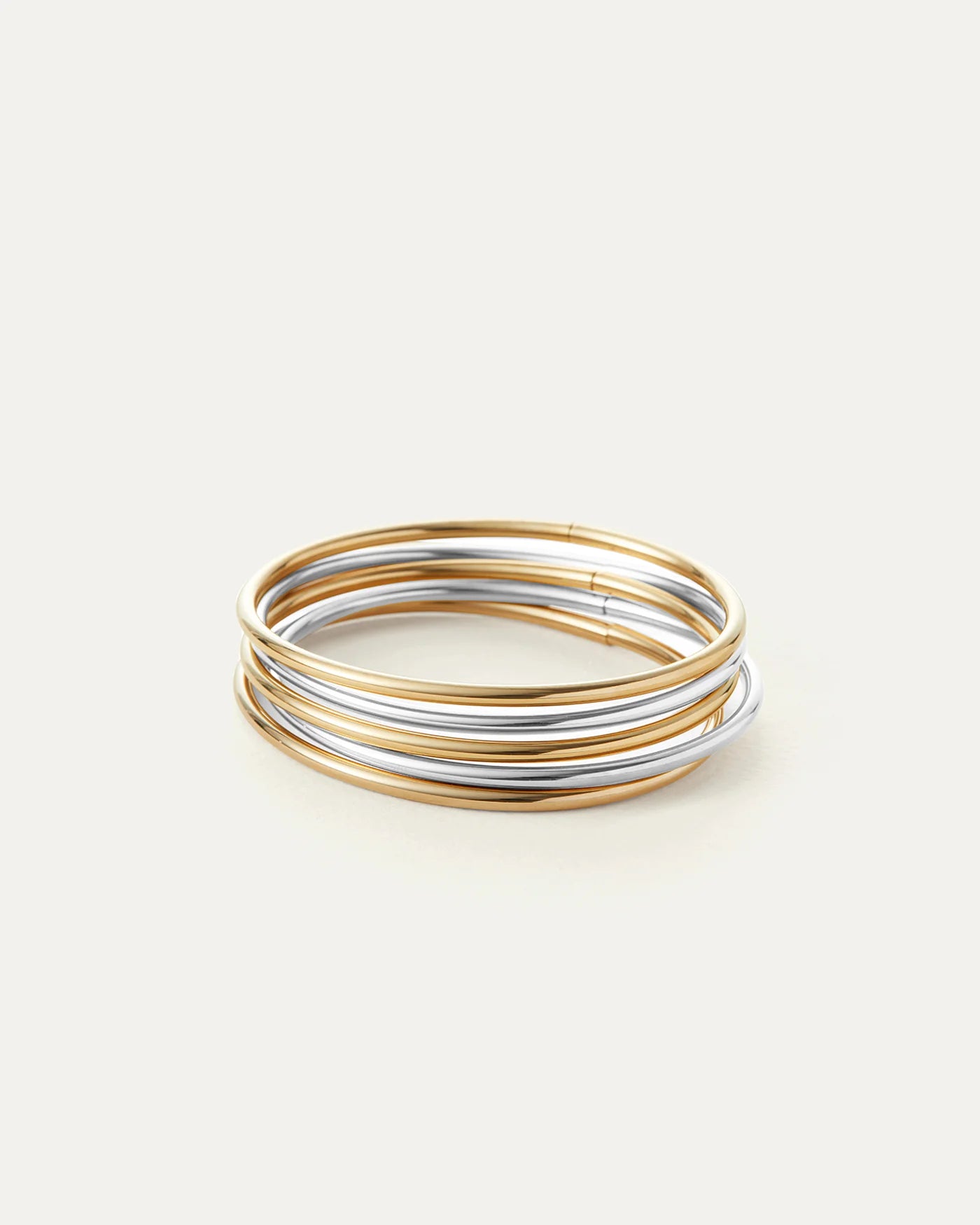 Stack of gold and silver bangles