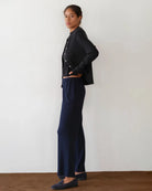 a woman wears a pair of navy blue rib lounge pants