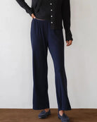 a woman wears a pair of navy blue rib lounge pants