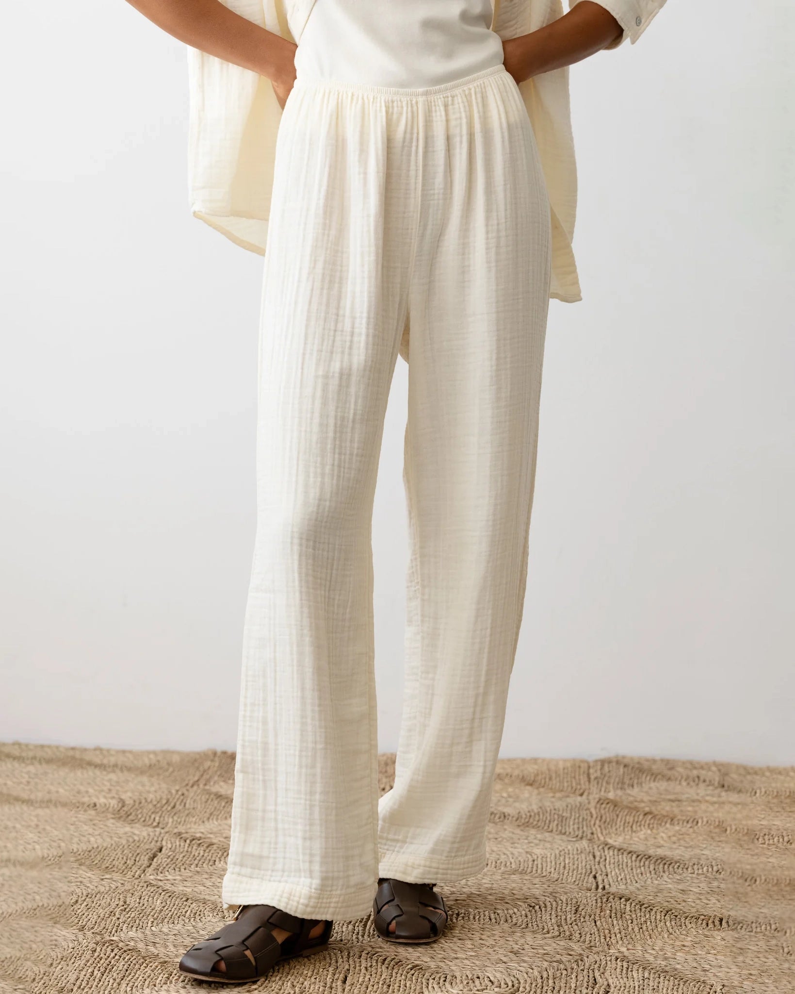 Woman wearing cream wide leg pants
