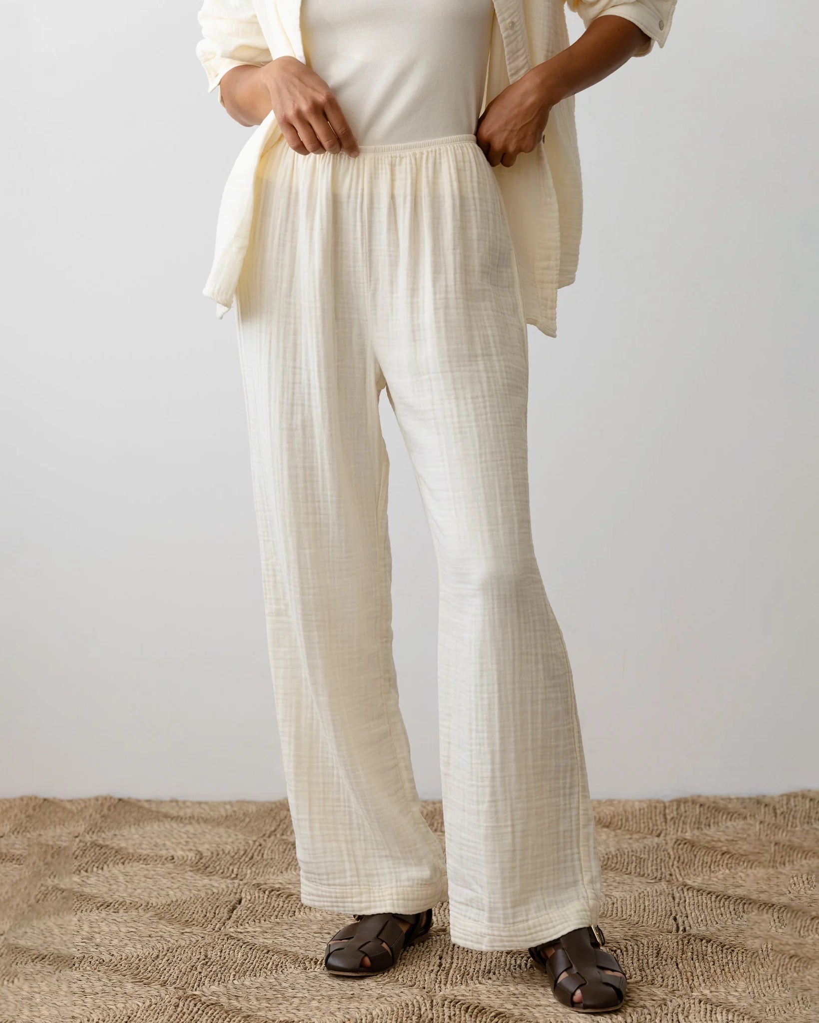 Woman wearing cream wide leg pants