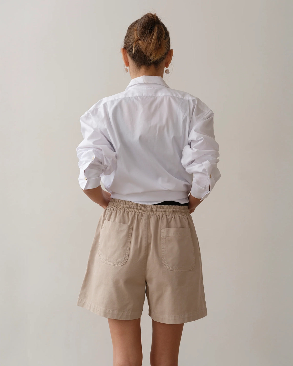 Woman wearing chino drawstring shorts