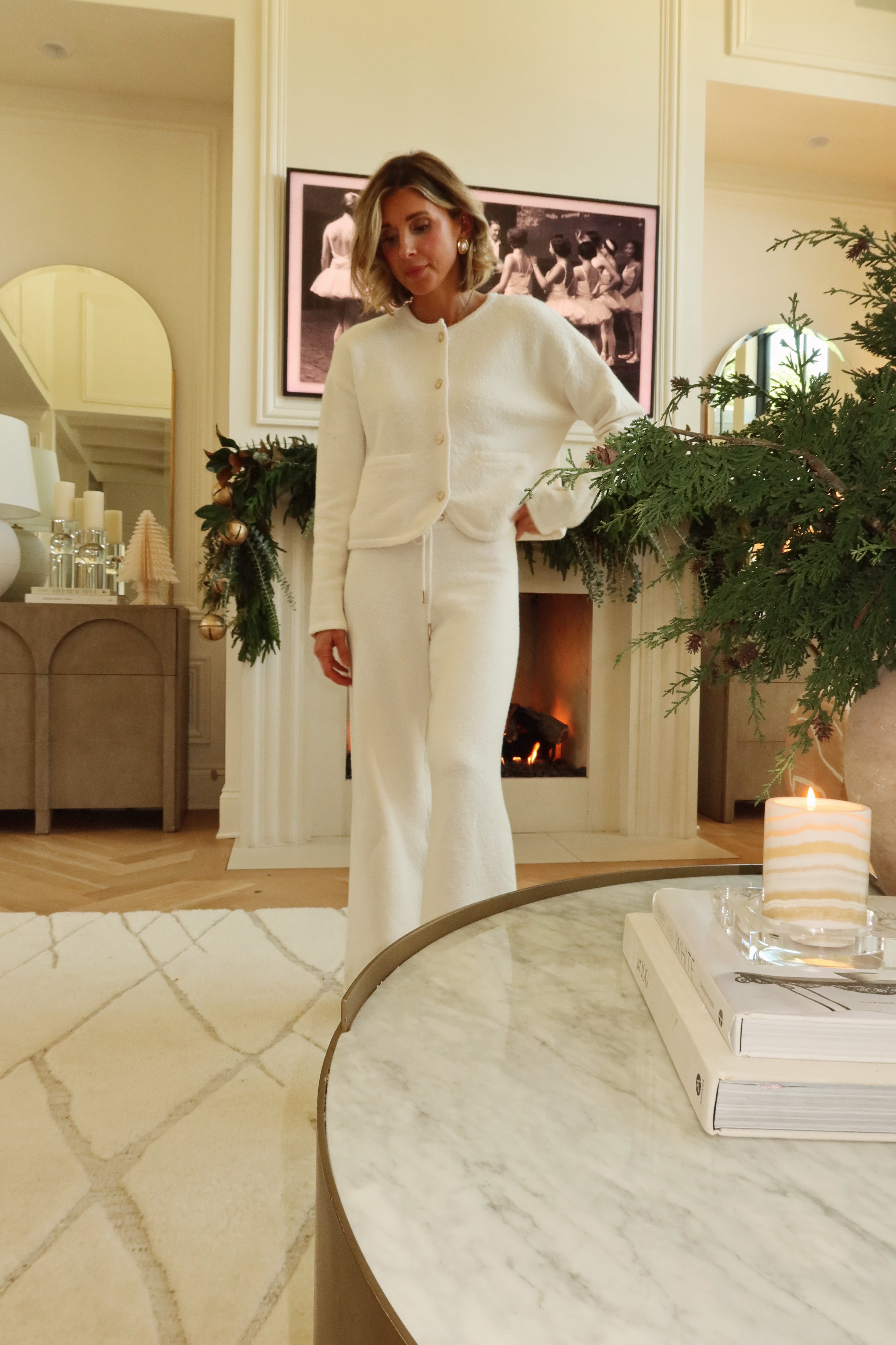 white cardigan with gold buttons