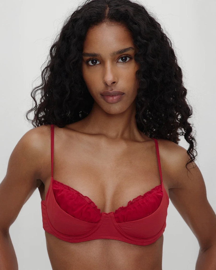 woman wearing frankies bikini austin bikini top in valentine red from the bella hadid collaboration