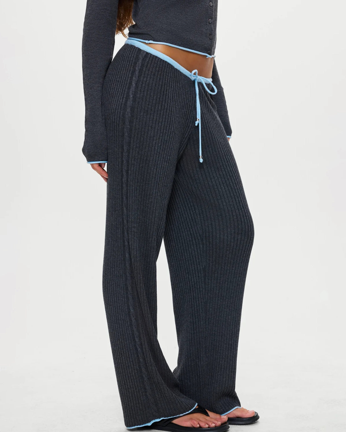 Dark grey ribbed lounge pants with light blue drawstring