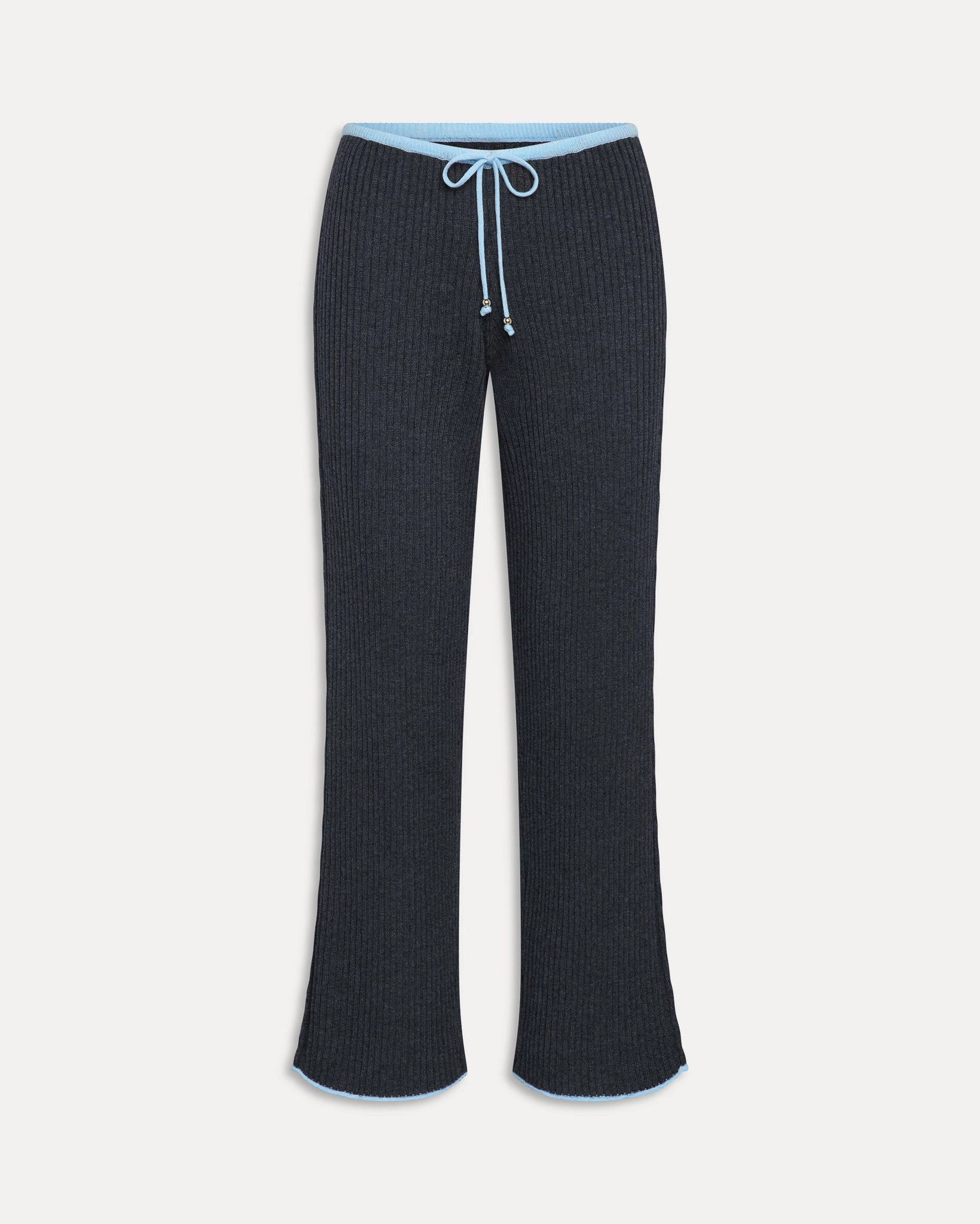 a woman wears a dark grey ribbed lounge pants with light blue drawstring