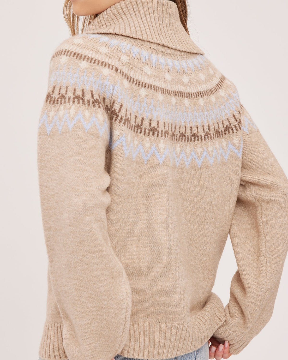 beige turtleneck sweater with fairisle design