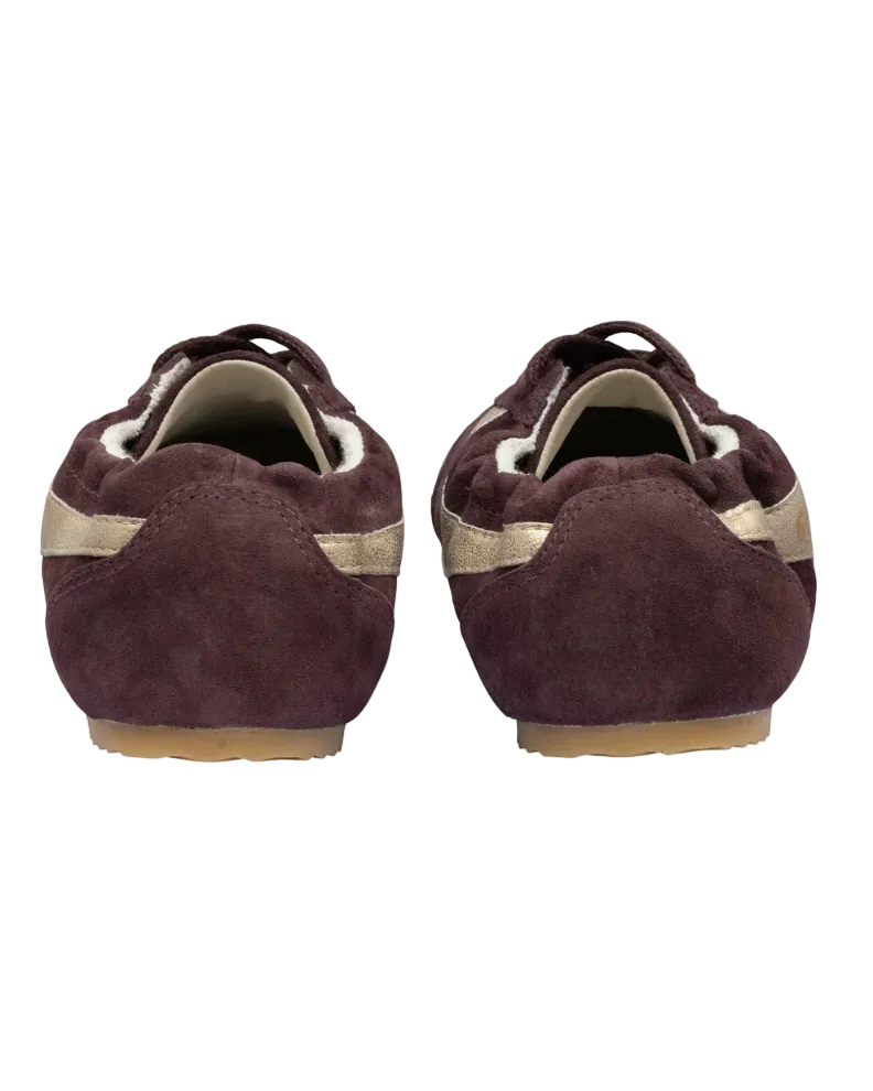 brown suede sneaker with gold details