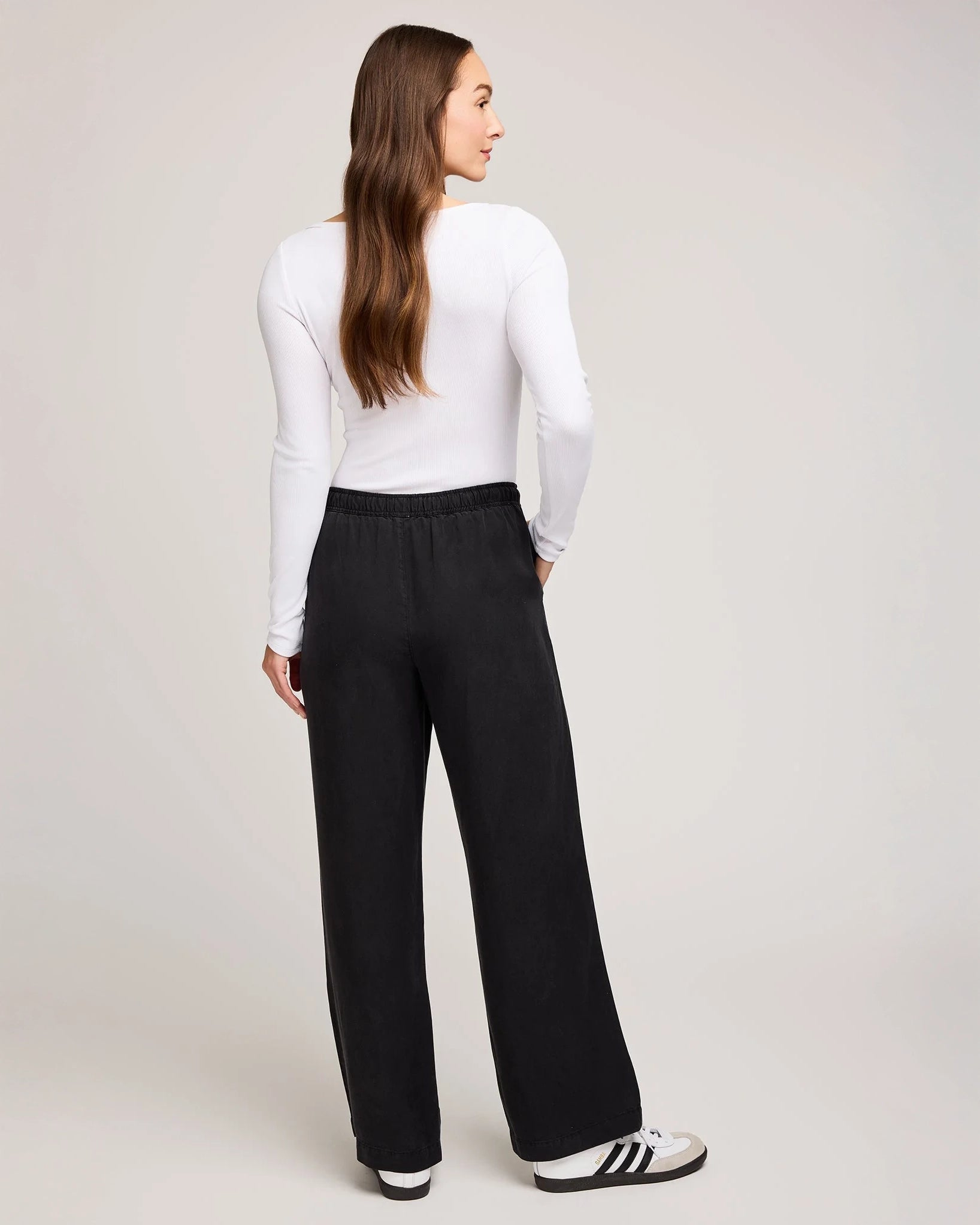 Person wearing black drawstring tencel pants