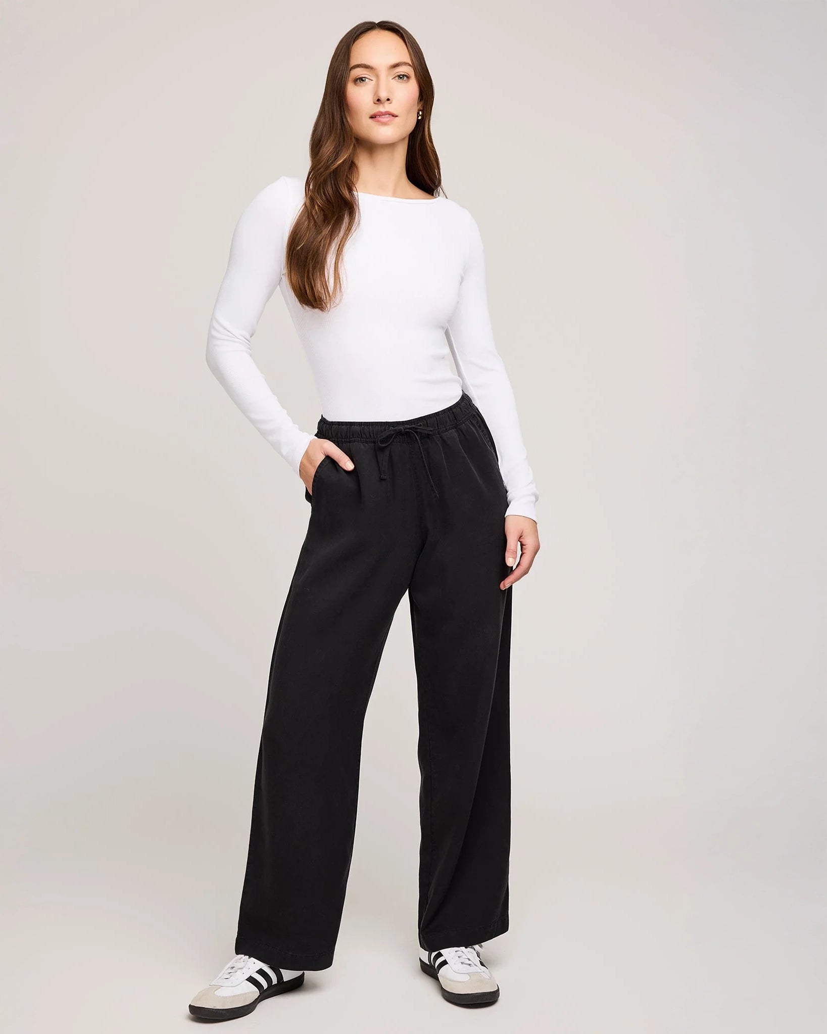 Person wearing black drawstring tencel pants