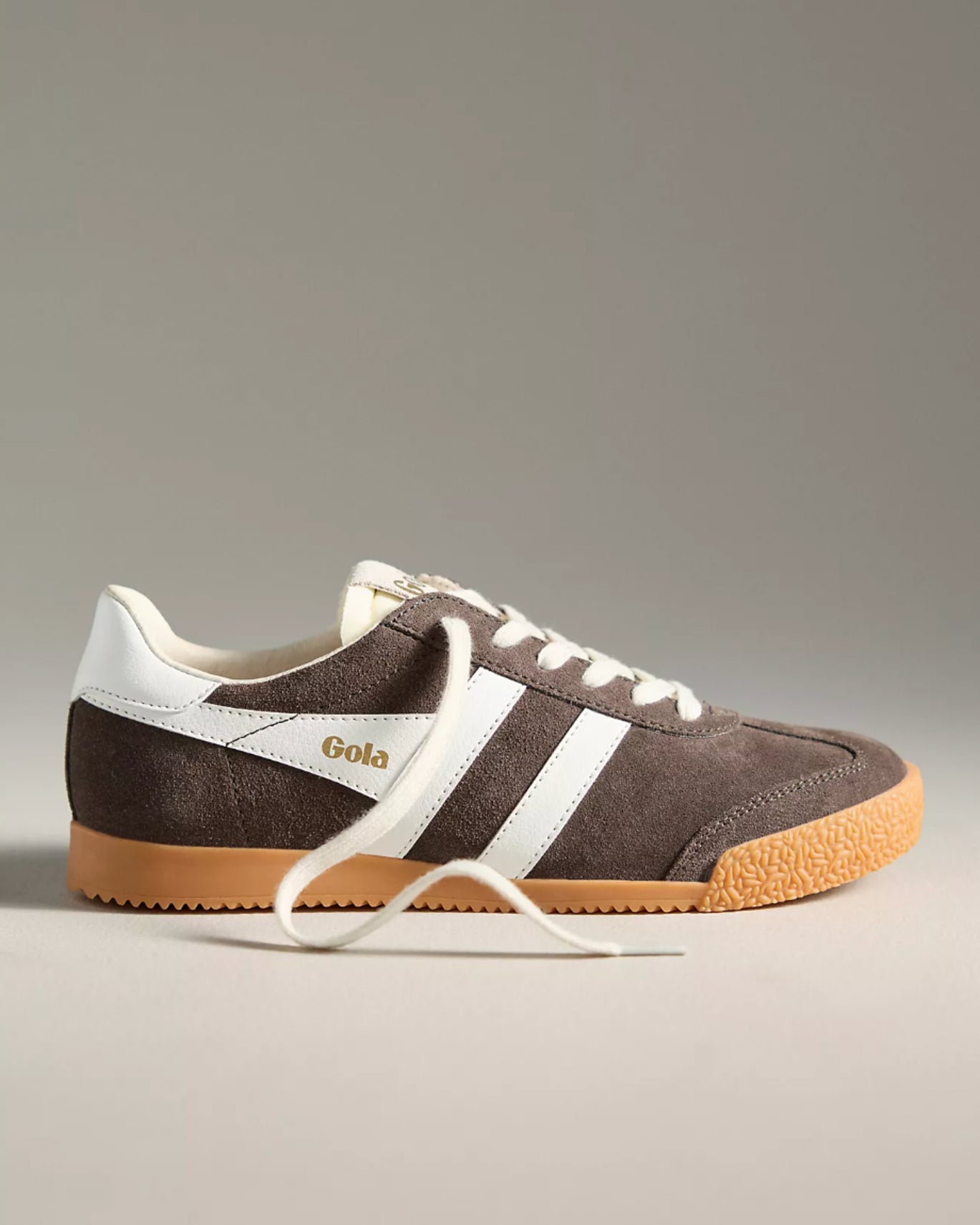 Gola suede sneaker in dark brown with white stripes and a tan rubber sole