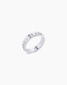 A silver-plated band ring with metallic silver studs and a textured surface.