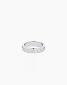 A silver-plated band ring with metallic silver studs and a textured surface.