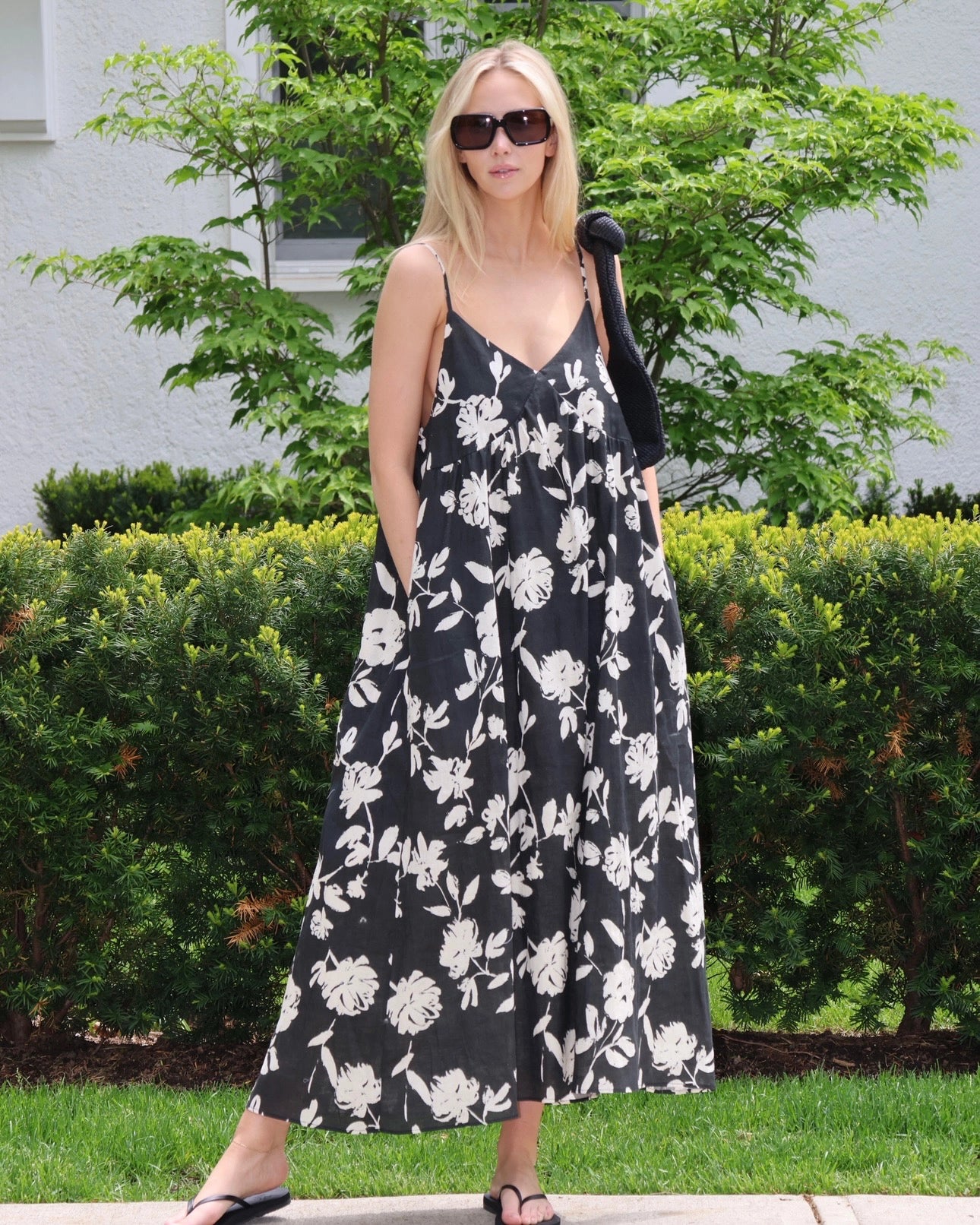 Woman wearing a black and white floral dress