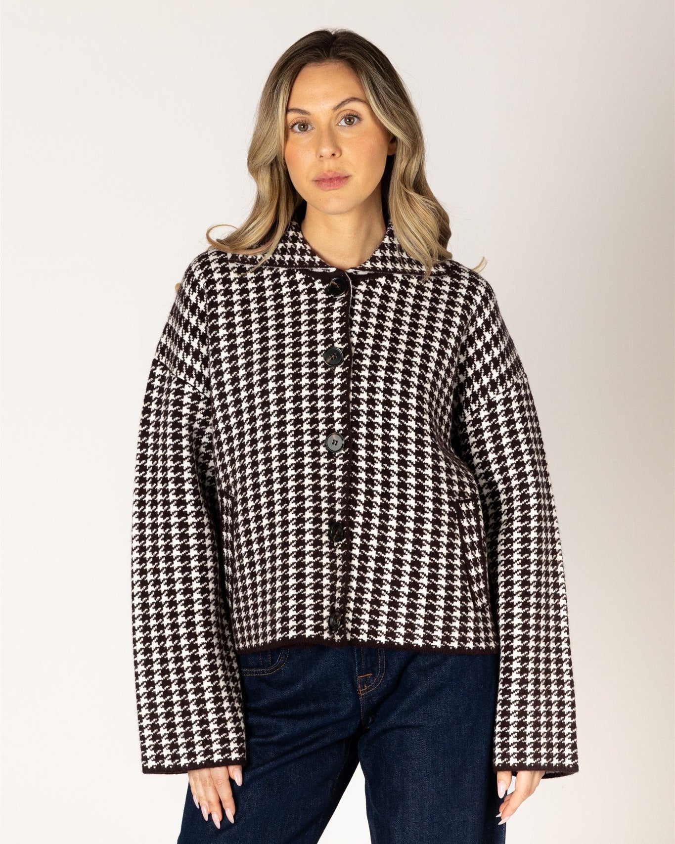 short coat in brown and white houndstooth design