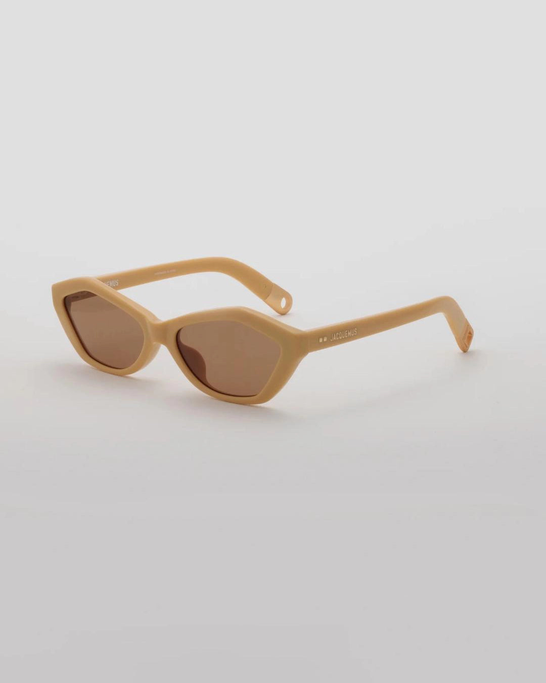yellow hexagonal sunglasses with brown lenses by Jacquemus