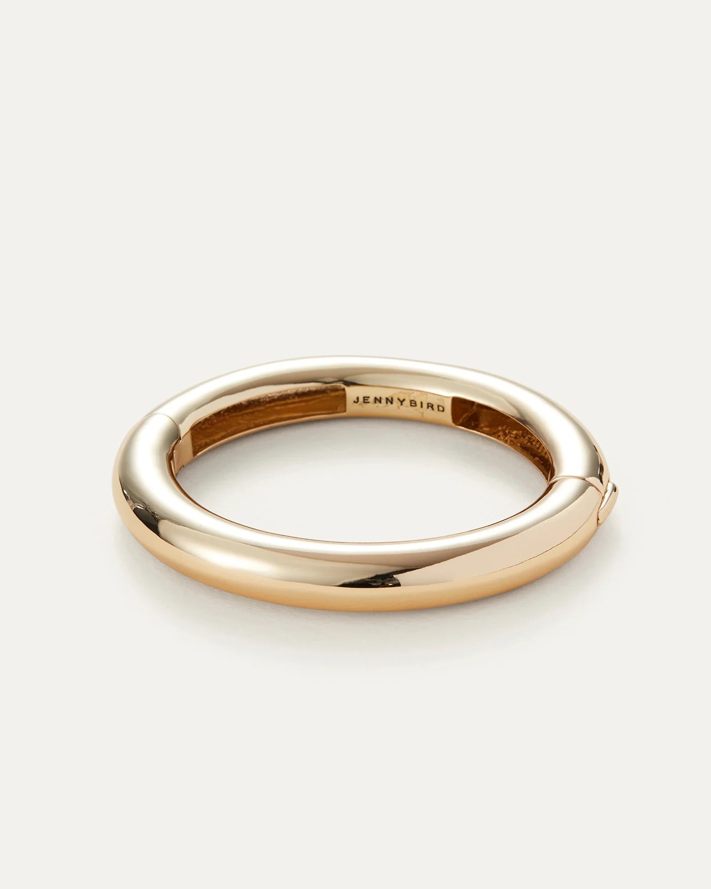 Chunky gold Gia Mega bangle bracelet by Jenny Bird