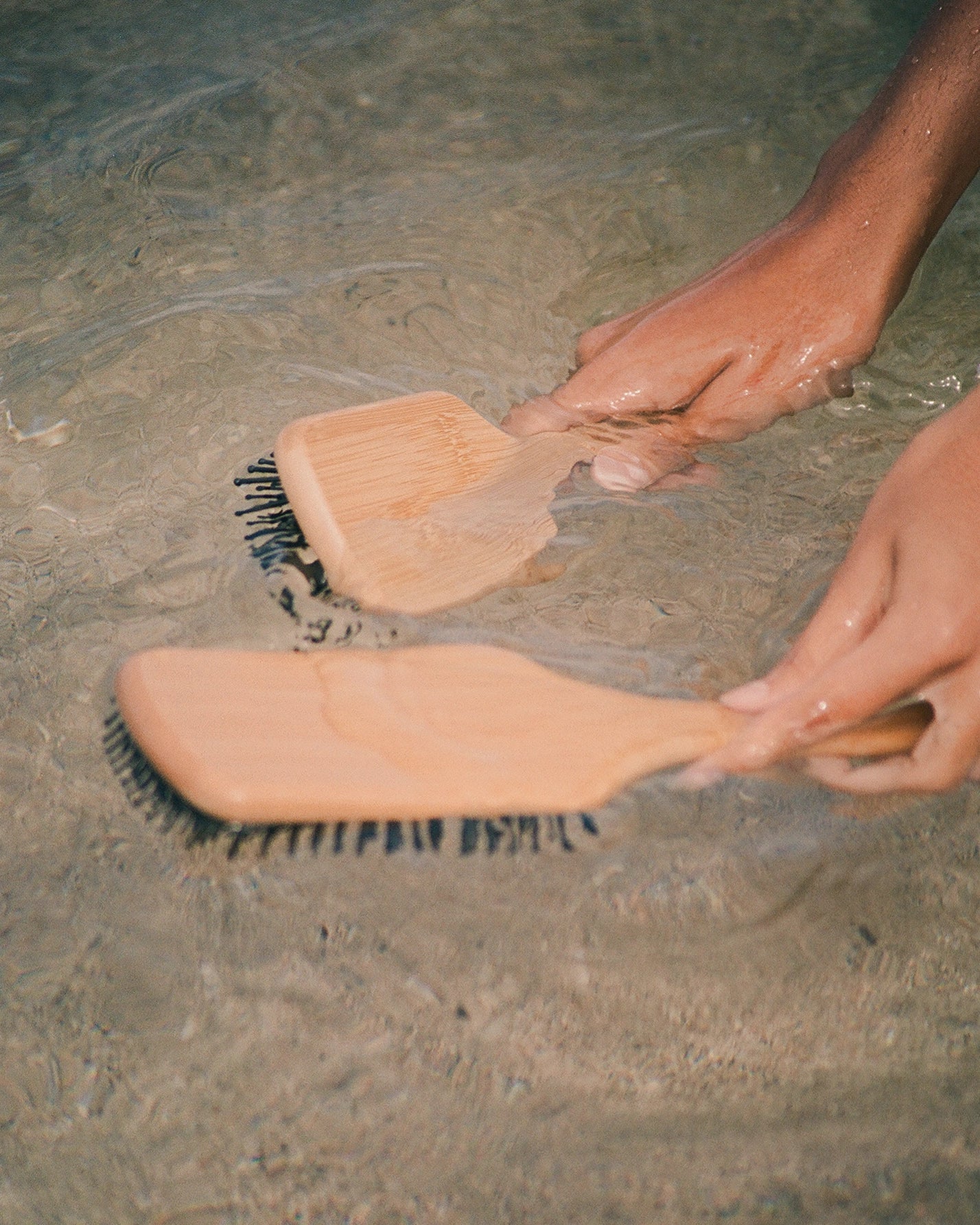 Two Hairbrushes with bamboo wooden handle and black bristles