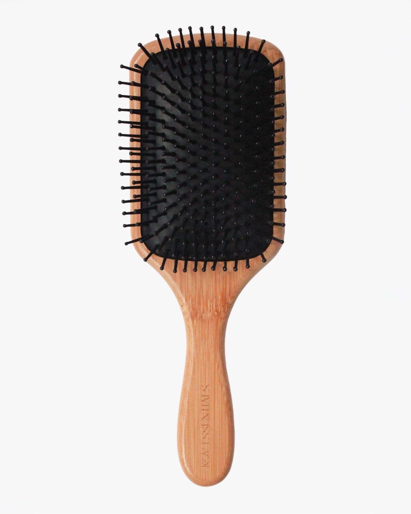 Hairbrush with bamboo wooden handle and black bristles