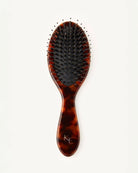 Tortoiseshell hairbrush with black bristles