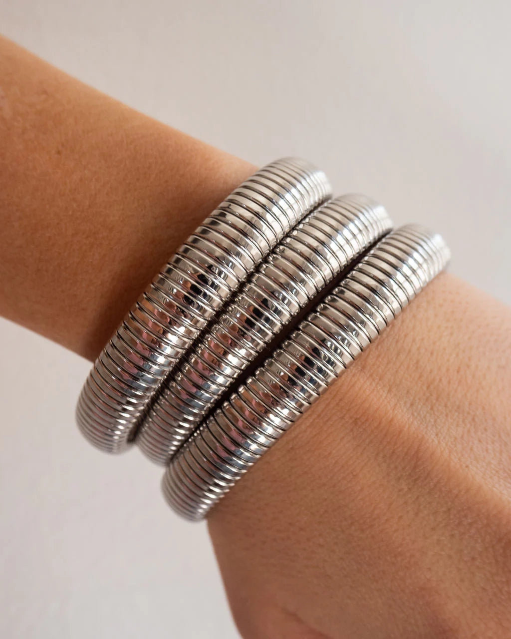 A silver snake chain bracelet from LUV AJ