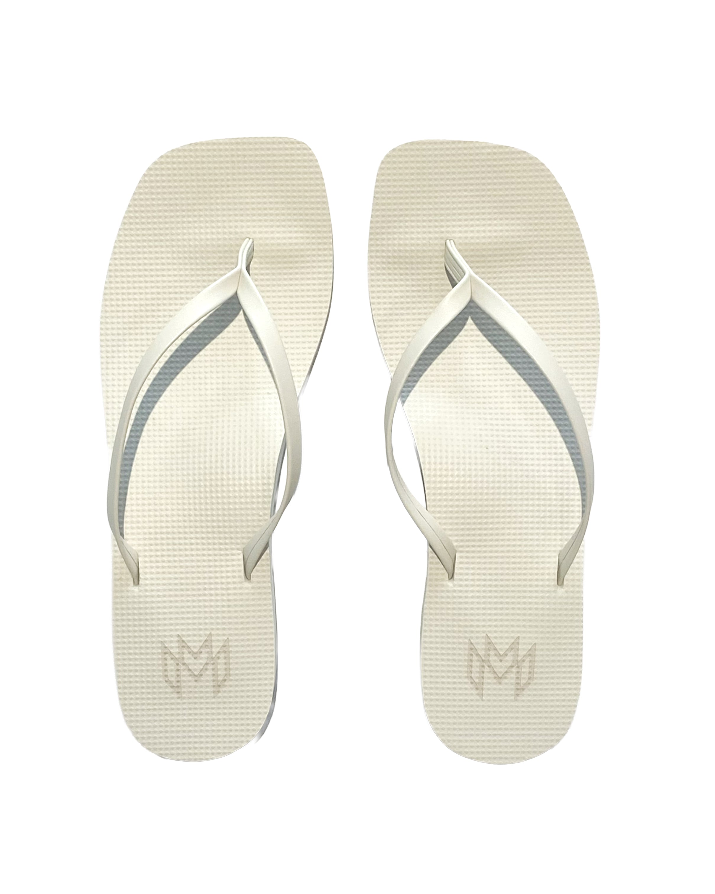 off white flip flops with a square toe
