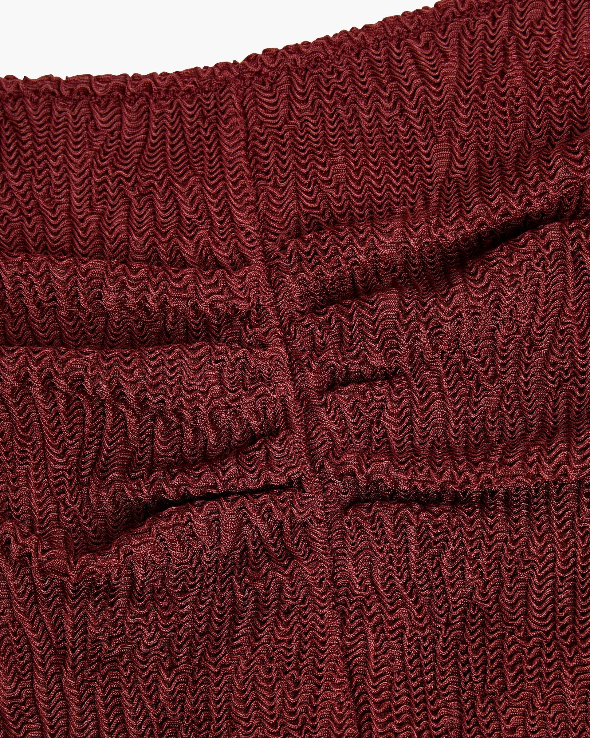 A knitted ribbed material bikini bottom in burgundy colour by OAS