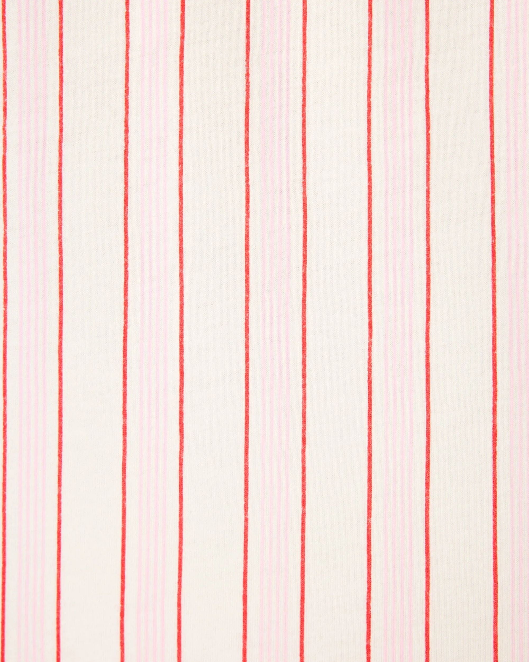 a close up of a pink and red stripe fabric