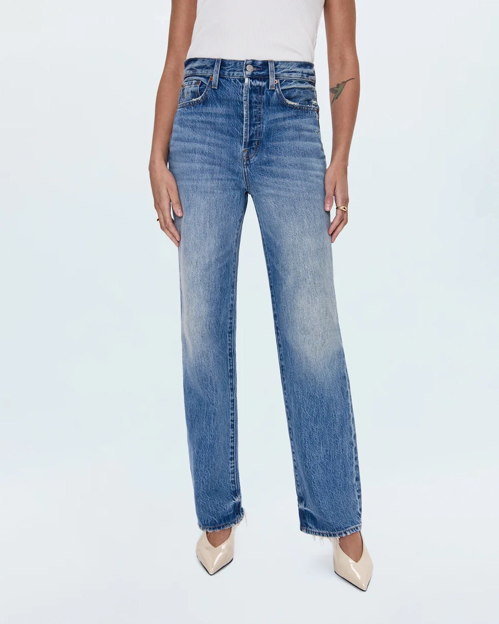 a woman wearing high rise straight jeans from Pistola