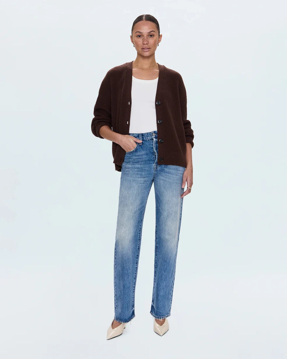 a woman wearing high rise straight jeans from Pistola