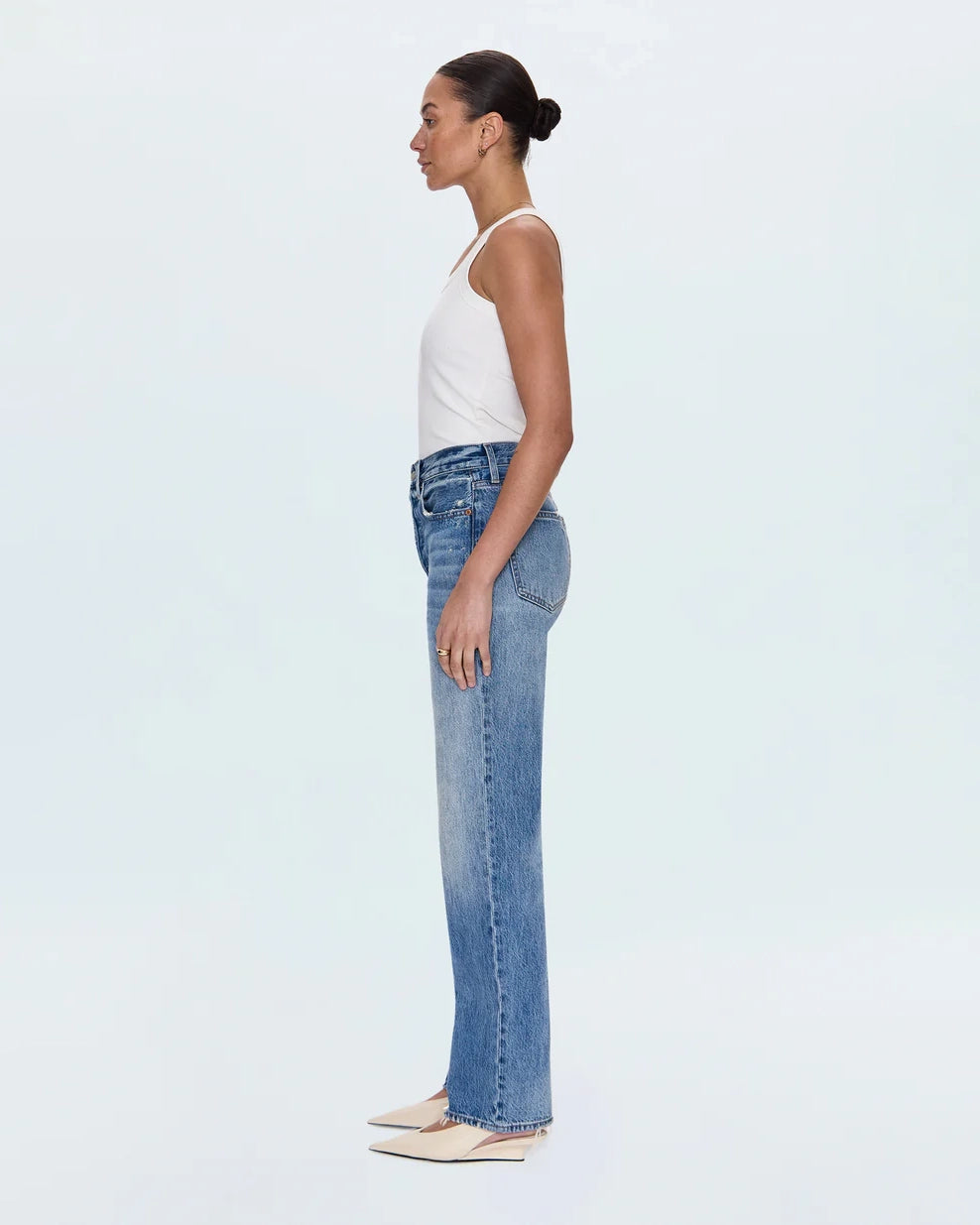 a woman wearing high rise straight jeans from Pistola