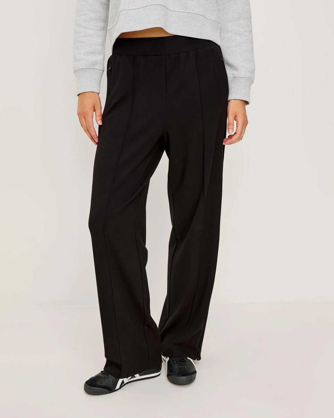 a pair of pleated black elasticated pants by Rails