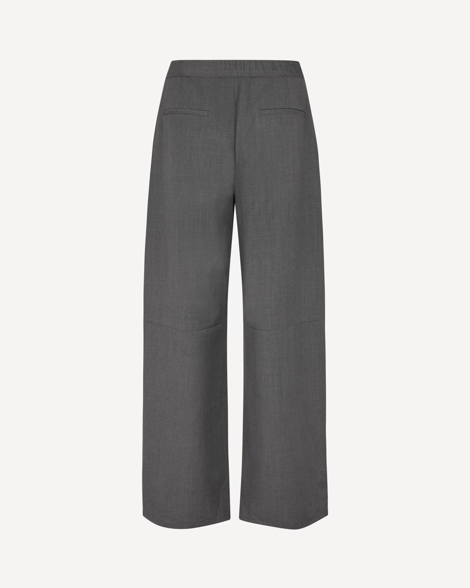 a pair of grey high-waisted Saroko pants by Samsøe Samsøe