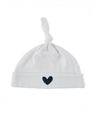 Small white baby hat with black heart on it