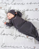 baby wearing 'I Love you' sleep sack and hat