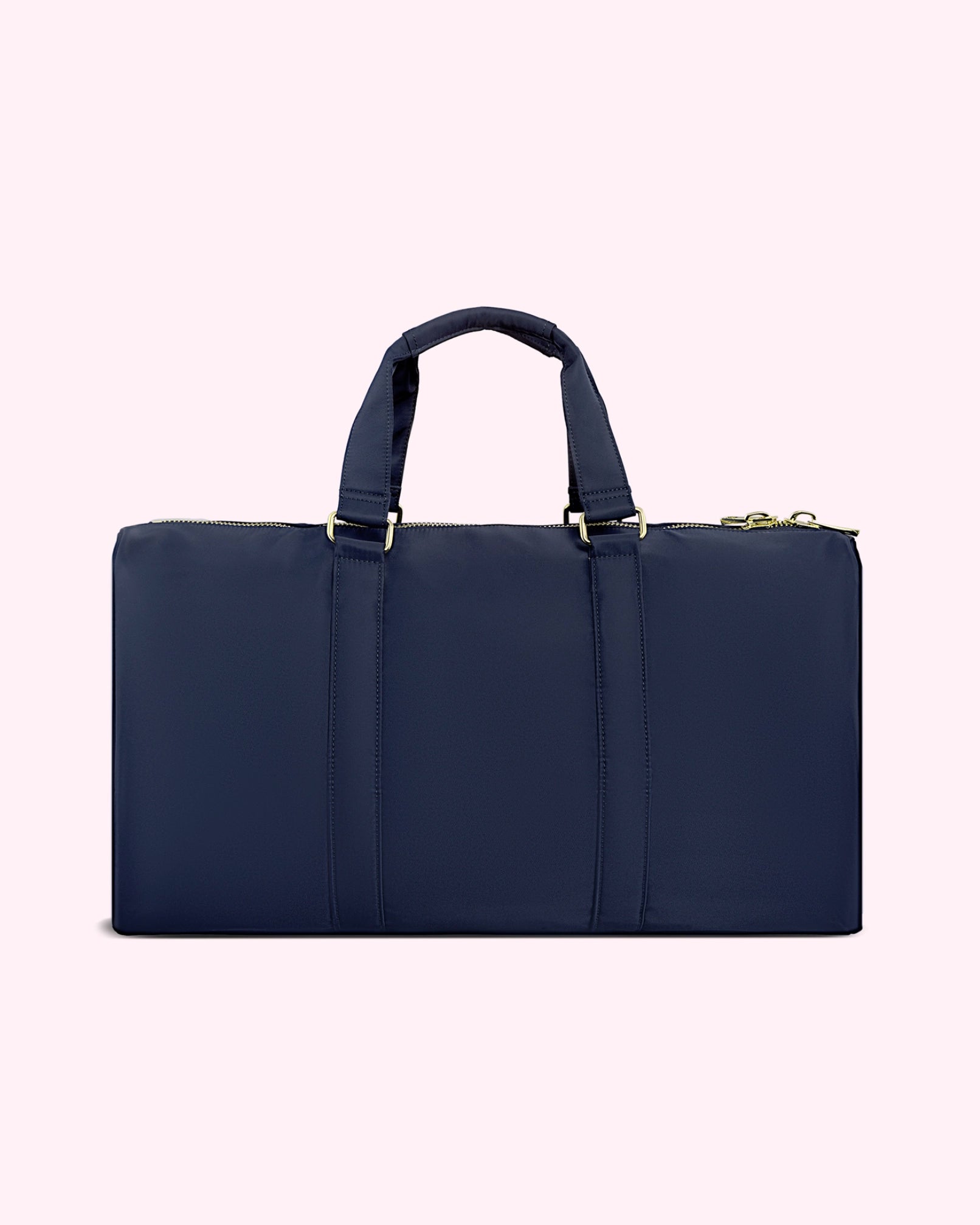 Navy blue duffel bag with gold accents by Stoney Clover Lane