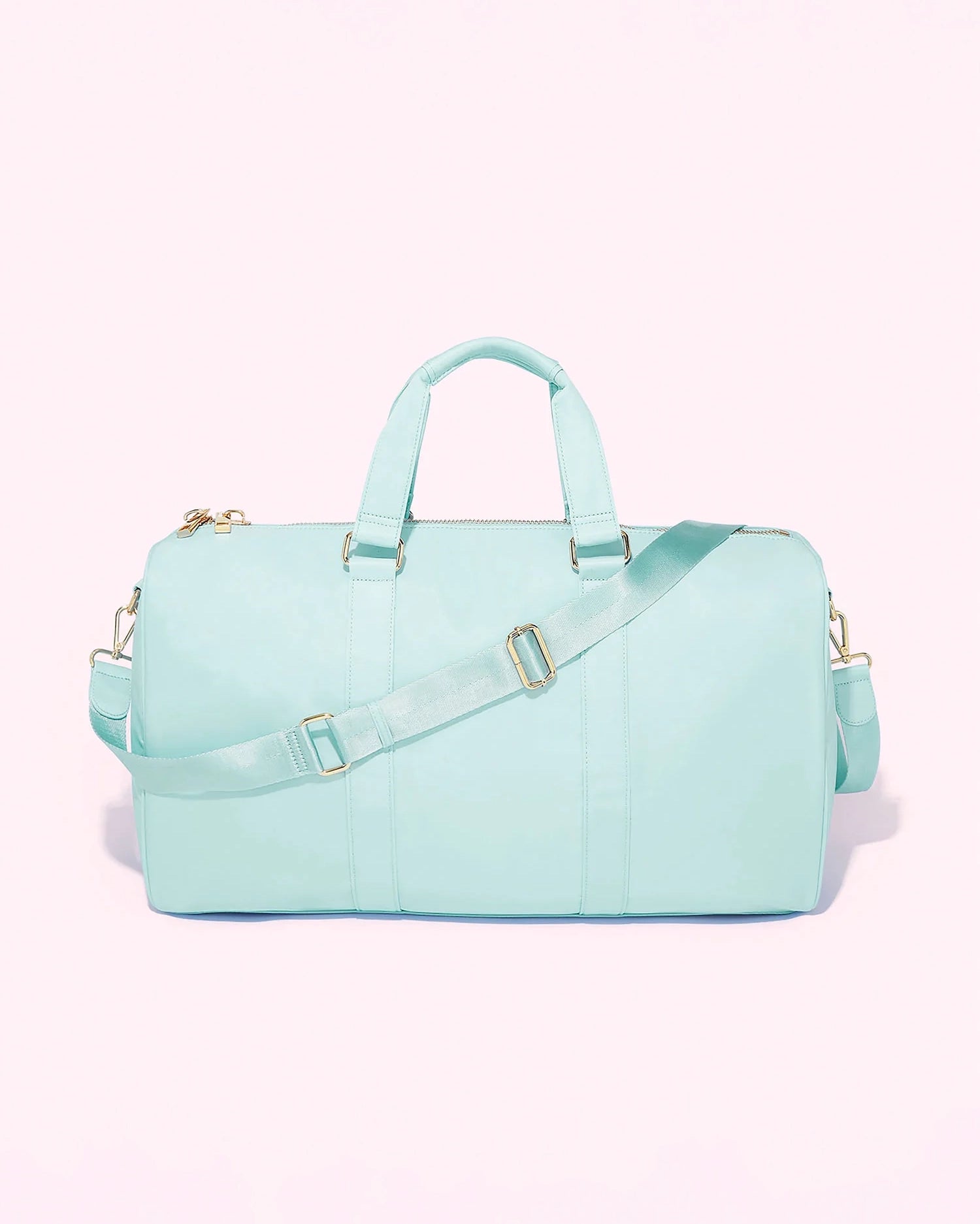 Light blue duffel bag with gold accents by Stoney Clover Lane