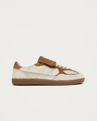 pony hair cream and tan leather sneaker with a rubber sole