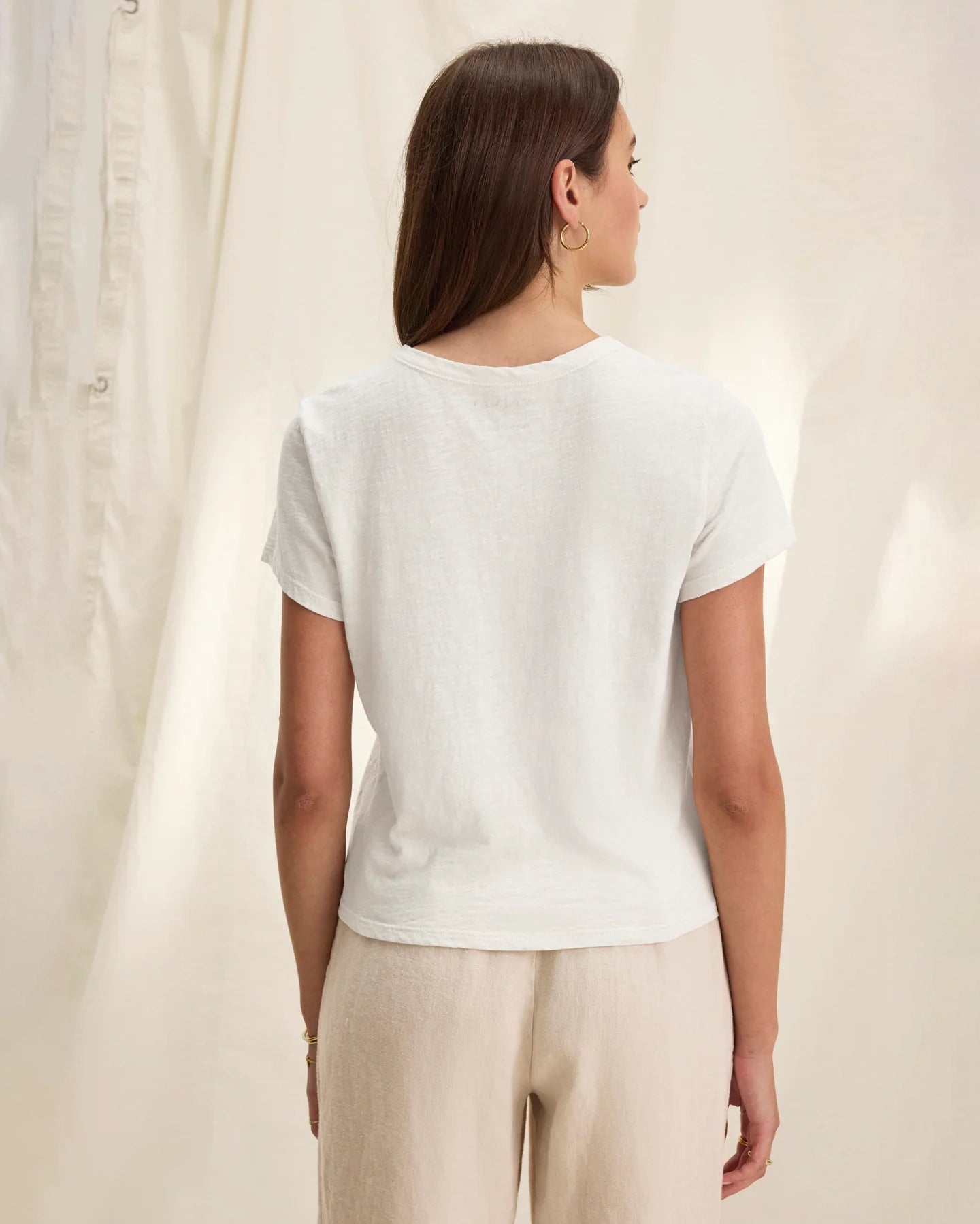 Woman wearing a white cotton slub t-shirt
